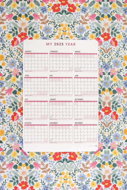 Floral-patterned calendar for 2025 with a grid layout.